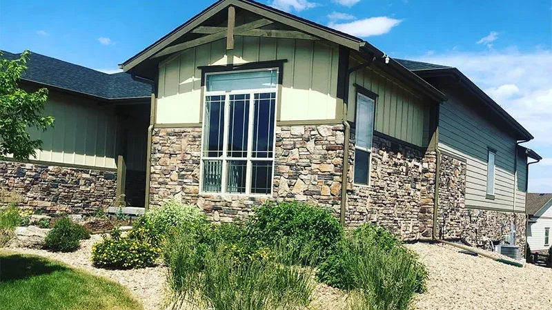 Spotless windows of a Littleton CO home shining in the sun